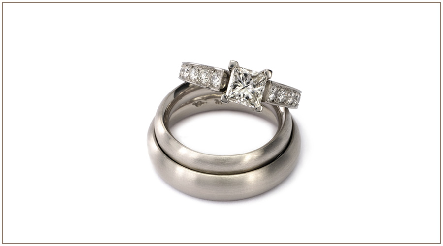 Bernhard Grassl Juwelier München Verlobungsring Princess Solitaire und Trauringe in Platin
